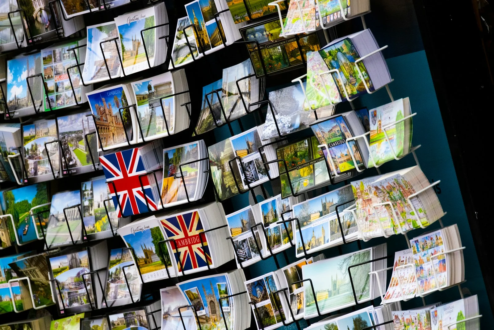 A bunch of pictures hanging up on a wall A bunch of pictures hanging up on a wall